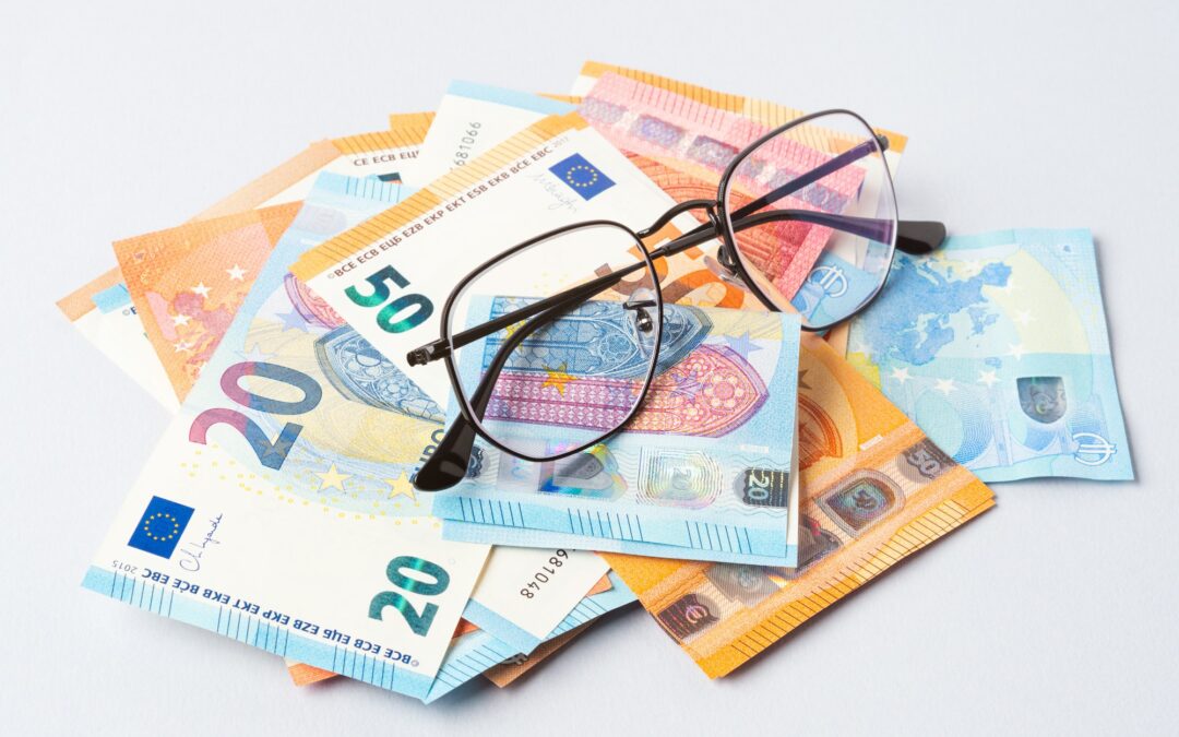 Euro money banknotes and glasses, online banking, business, student loan concept